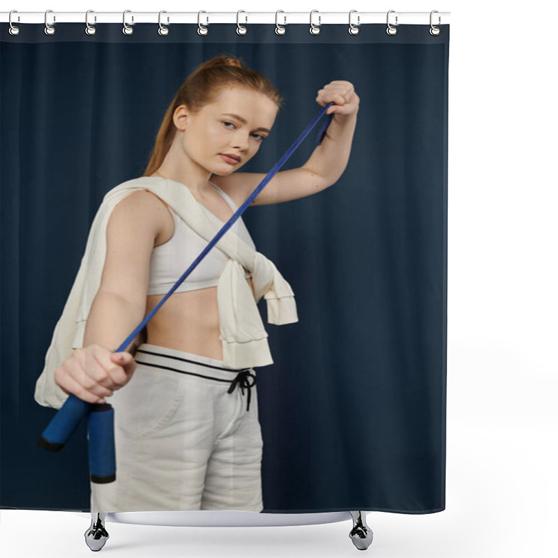 Personality  Young Woman In White Attire Holding Blue Jump Rope Against Vivid Backdrop. Shower Curtains