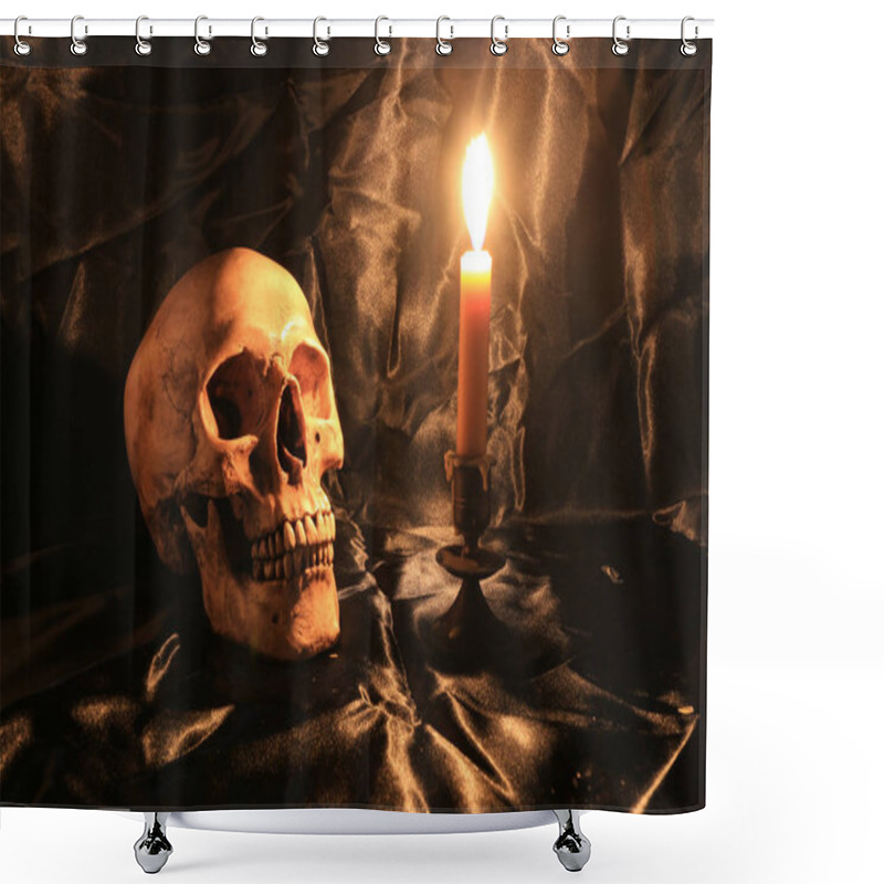 Personality  Still Life Of Skull  With Fetters And Candle On Black Fabric With Texture With Candle Light In Dim Light Night. Image Tone From Candle Light In Night Time. Shower Curtains