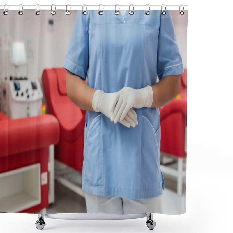 Personality  Partial View Of Multiracial Healthcare Worker In Blue Uniform And Latex Gloves Standing Next To Blurred Medical Chairs And Transfusion Machines In Blood Donation Center Shower Curtains