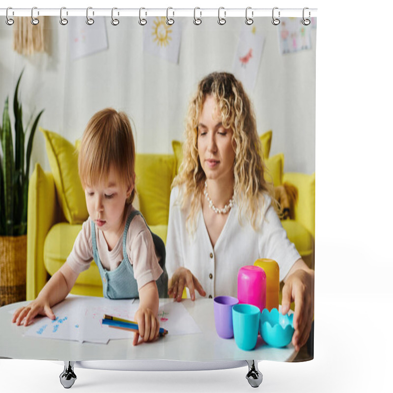 Personality  A Woman With Curly Hair Sits At A Table With Her Toddler Daughter, Engaging In Montessori Learning Activities At Home. Shower Curtains