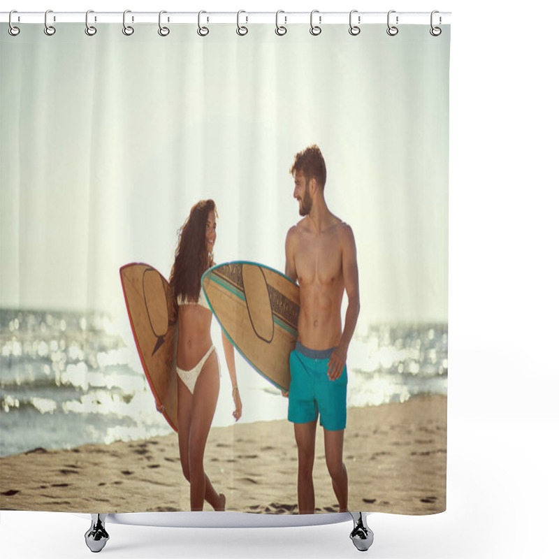 Personality  Young Attractive Couple Sourfing Together On The Beach Shower Curtains