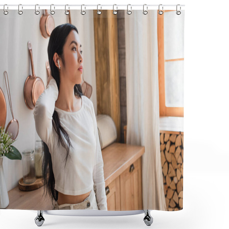 Personality  Tired Young Asian Woman In White Blouse Standing With Earphones And Holding Hand Near Neck In Kitchen Shower Curtains