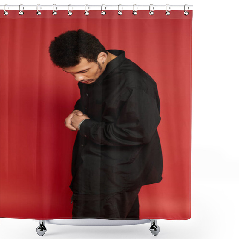 Personality  Young Man Looks Down Thoughtfully While Dressed In A Black Shirt, Set Against A Bright Red Backdrop. Shower Curtains