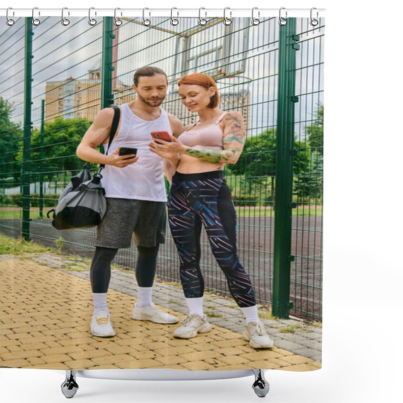 Personality  A Man And Woman In Sportswear Stand Side By Side Outdoors, Holding Smartphones Shower Curtains