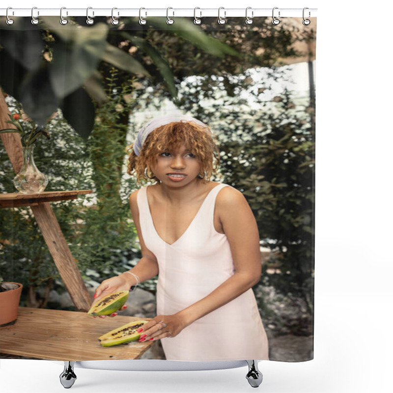 Personality  Smiling Young African American Woman In Headscarf And Summer Dress Holding Cut And Ripe Papaya While Standing Near Green Plants In Greenery,  Lady Inspired By Tropical Plants, Summer Concept Shower Curtains