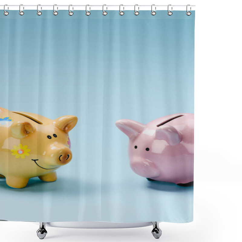 Personality  Close Up View Of Two Yellow And Pink Piggy Banks Isolated On Blue Shower Curtains