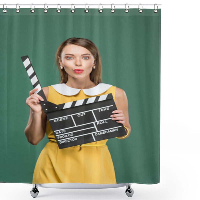 Personality  Beautiful Stylish Woman In Yellow Dress Looking At Camera, Pouting Lips And Holding Film Clapperboard Isolated On Green Shower Curtains