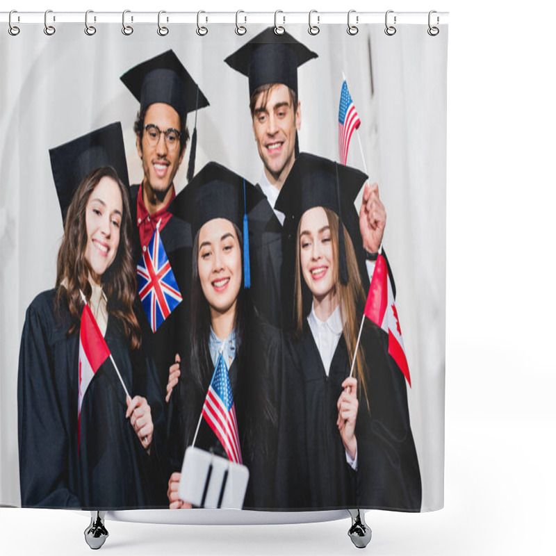 Personality  Selective Focus Of Cheerful Students In Graduation Gowns Holding Flags Of Different Countries And Taking Selfie On Smartphone  Shower Curtains