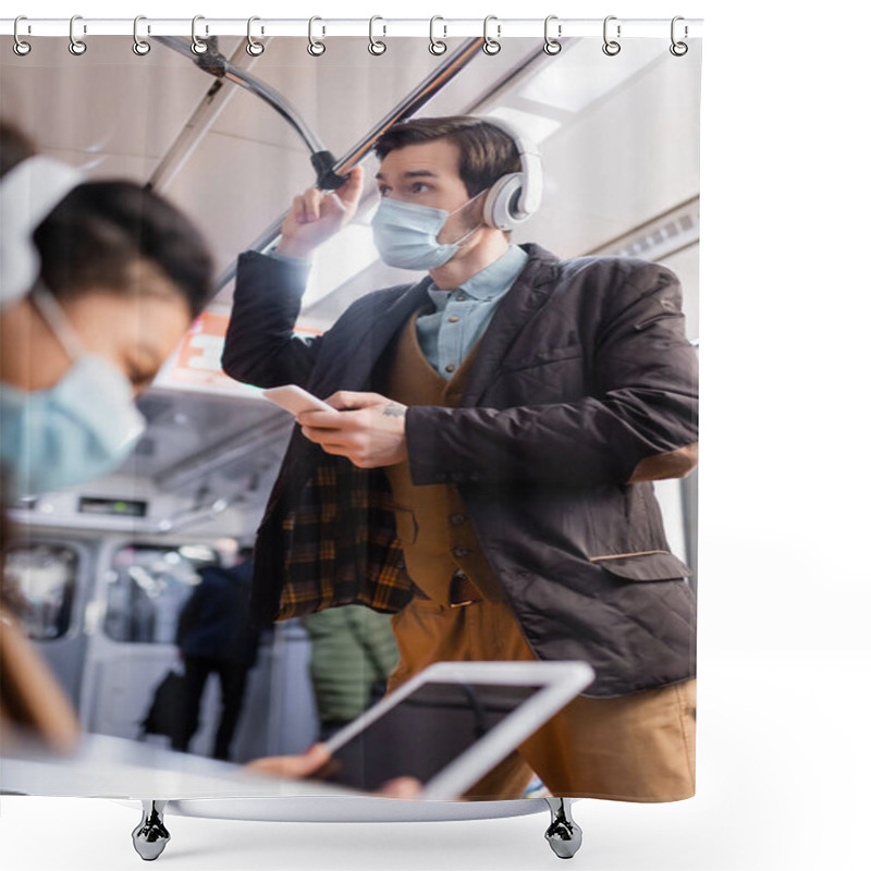 Personality  Man In Headphones Holding Smartphone Near African American Woman In Medical Mask Using Digital Tablet On Blurred Foreground  Shower Curtains