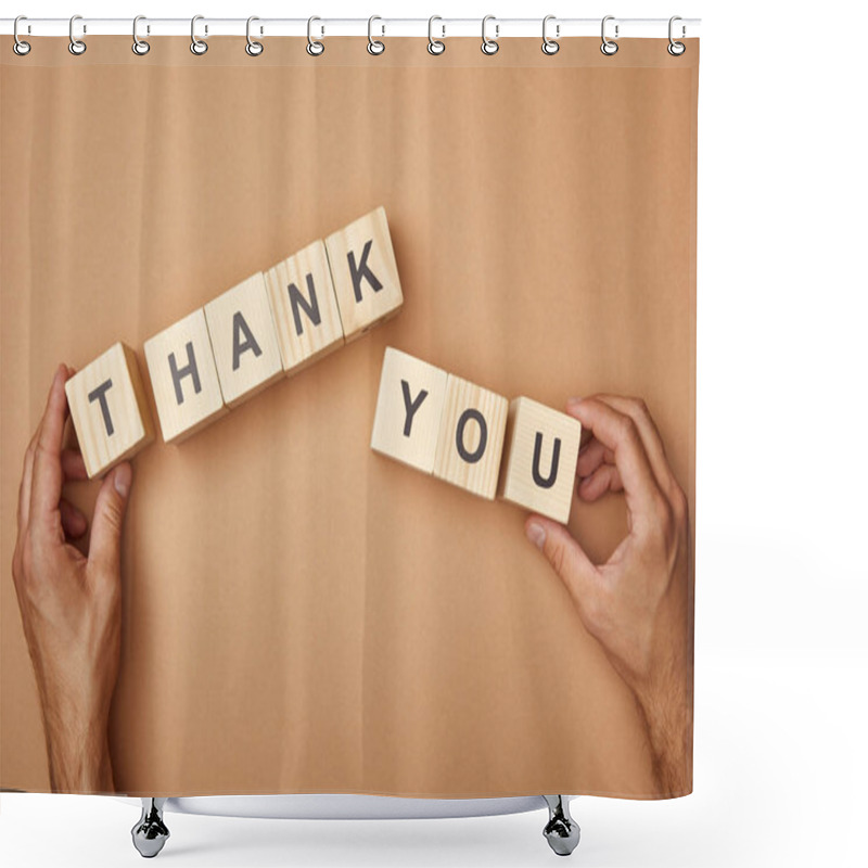 Personality  Cropped View Of Man Holding Wooden Cubes With Thank You Lettering On Beige Background Shower Curtains