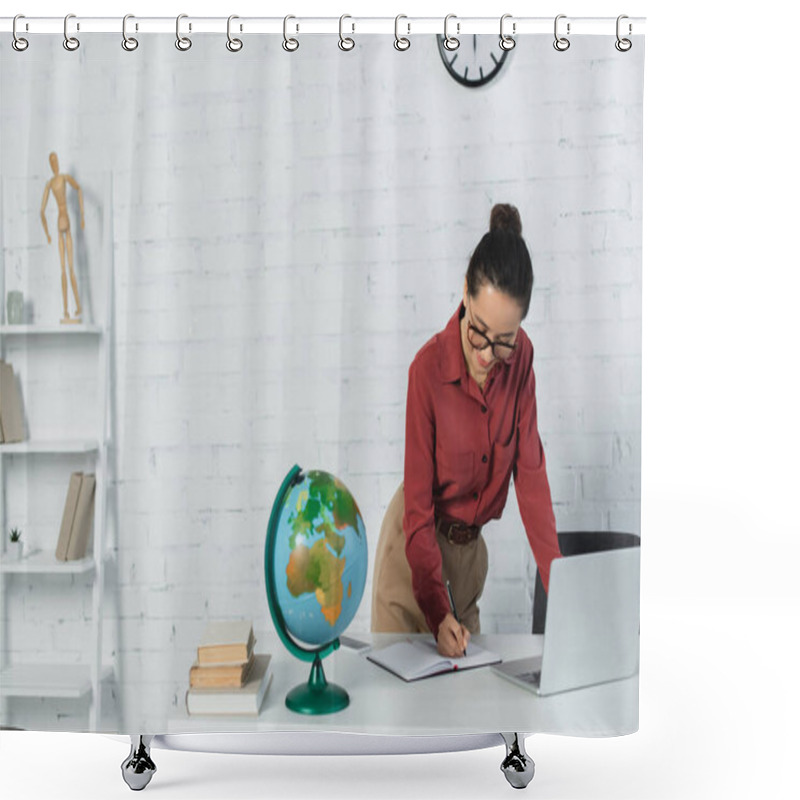 Personality  Smiling Teacher In Eyeglasses Writing Near Globe And Devices On Desk Shower Curtains