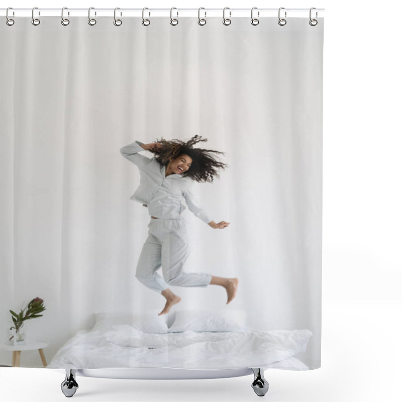 Personality  Vertical View Of Happy Mixed Race Woman Dancing In Morning, Jumping Over Bed In Pajamas. Excited Female Spending Day Of In Hotel Or At Home, Having Fun, Feeling Joyful Mood. Careless, Carefree Concept Shower Curtains