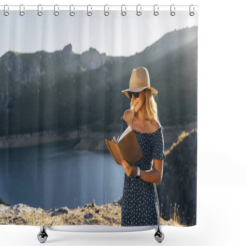 Personality  A Woman Wearing A Hat And Sunglasses Is Peacefully Reading A Book By A Picturesque Lake And Mountains On A Sunny Day Shower Curtains