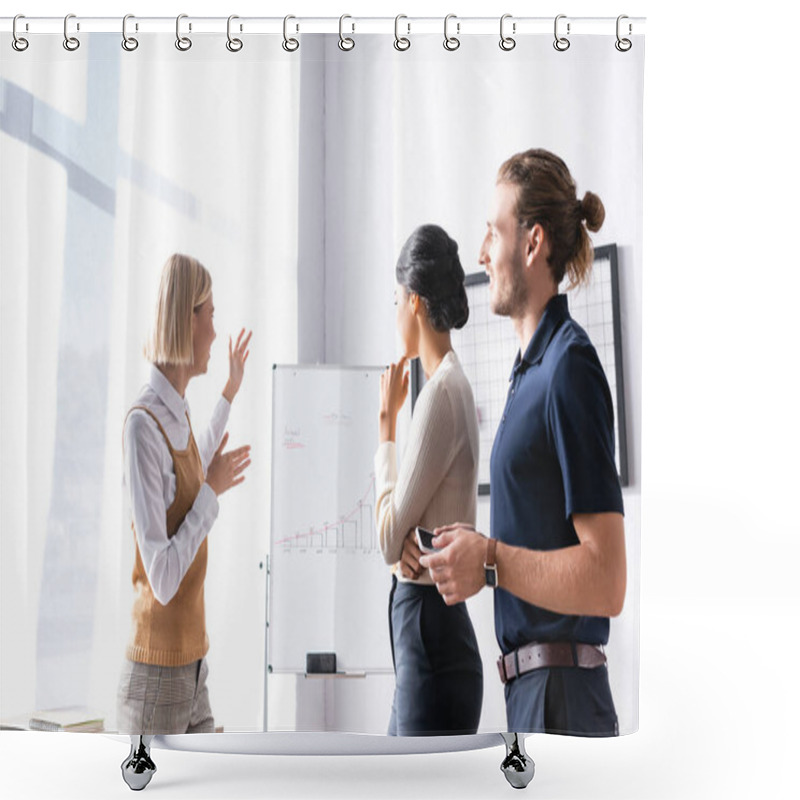 Personality  Multicultural Office Workers Looking At Businesswoman Gesturing While Standing Near Flipchart With Graphic During Meeting Shower Curtains