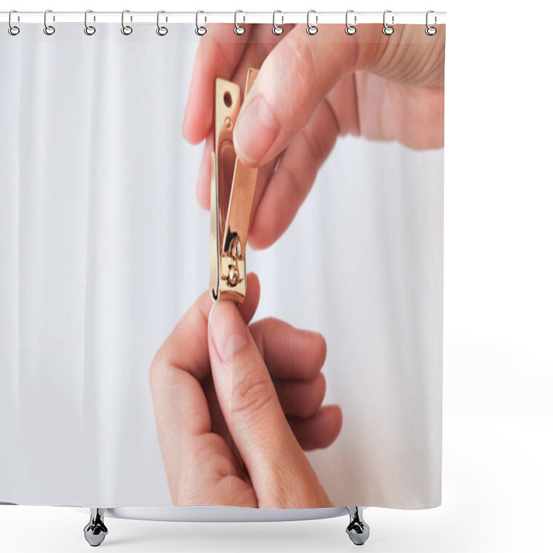 Personality  Woman Hands Using A Nail Clippers To Cut Her Fingernails On A White Background. View From Above. Manicure At Home. Shower Curtains