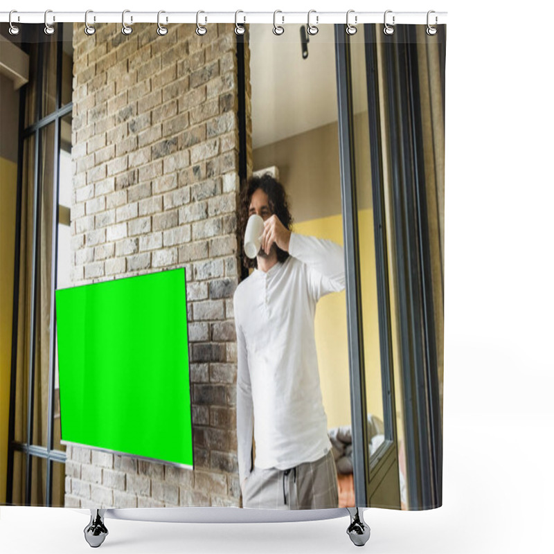 Personality  Young Man In Pajamas Drinking Coffee While Standing Near Green Lcd Screen Hanging On Brick Wall Shower Curtains