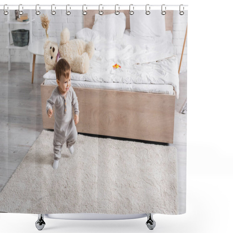 Personality  Happy Baby Boy In Grey Romper Walking On Carpet Near Soft Toy On Bed  Shower Curtains