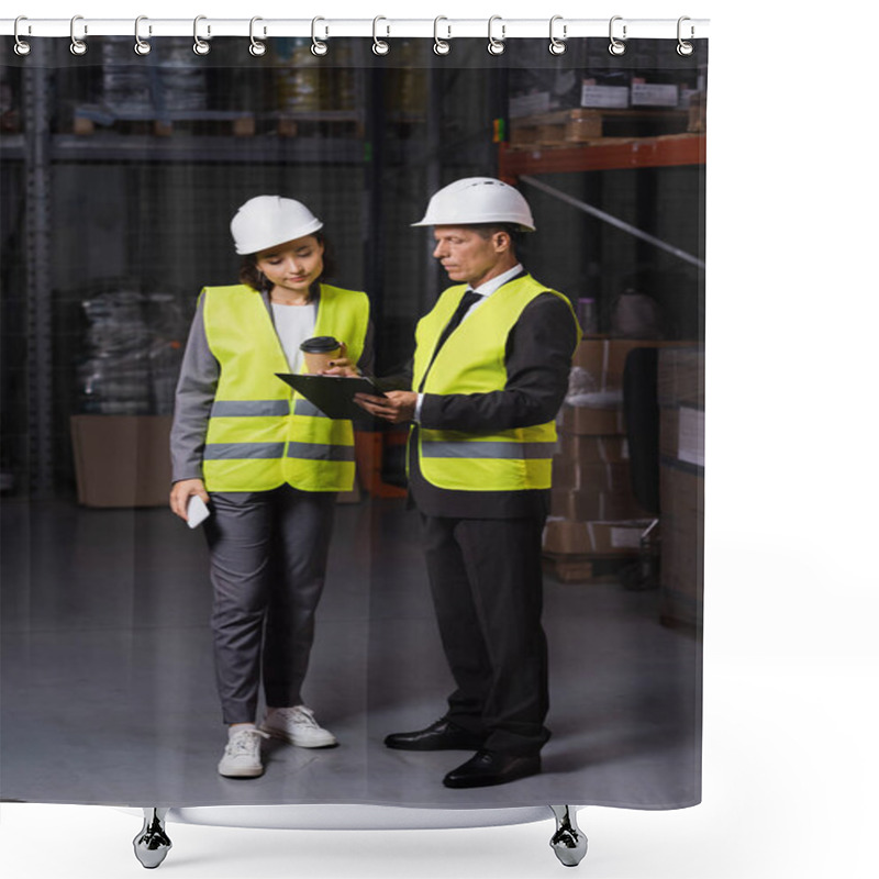 Personality  Warehouse Supervisor In Hard Hat Showing Clipboard To Female Employee With Coffee And Smartphone Shower Curtains