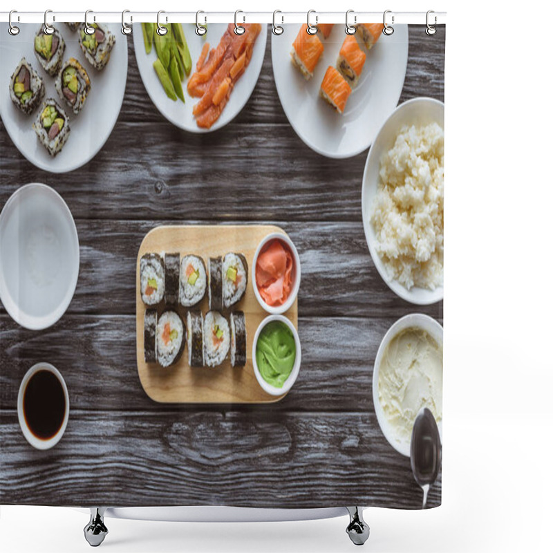 Personality  Top View Of Delicious Sushi Rolls With Ingredients On Wooden Table Shower Curtains