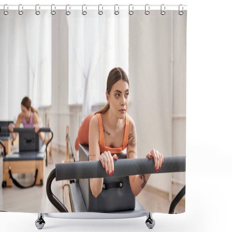 Personality  A Sporty Woman Exercising During A Pilates Lesson, Next To Her Friend. Shower Curtains