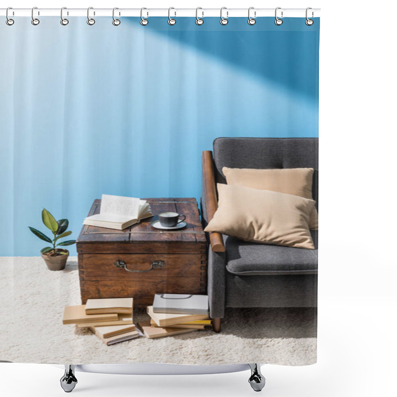 Personality  Old Wooden Chest With Cup Of Coffee And Books Near Couch In Front Of Blue Wall Shower Curtains