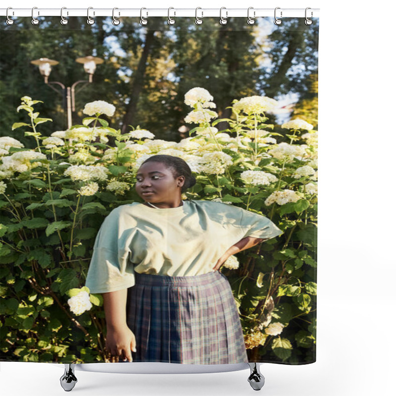 Personality  A Plus-size African American Woman Stands Confidently In Front Of A Bush With White Flowers, Embracing The Beauty Of Nature Around Her. Shower Curtains