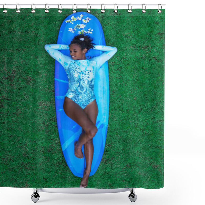 Personality  Surfer Girl With Afro Hairstyle In Blue One Piece Bikini Lying On The Back On Blue Longboard On Green Grass Shower Curtains