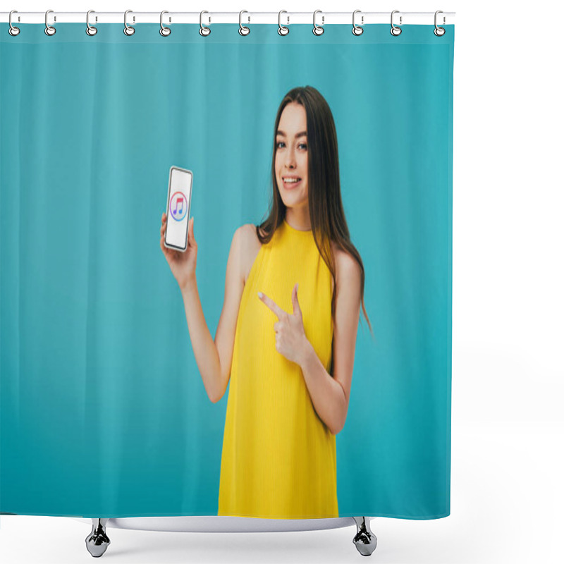 Personality  KYIV, UKRAINE - JUNE 6, 2019: Happy Beautiful Girl In Yellow Dress Pointing With Finger At Smartphone With ITunes App Isolated On Turquoise Shower Curtains