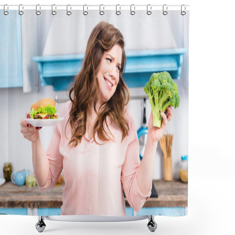 Personality  Portrait Of Overweight Woman With Burger And Fresh Broccoli In Hands In Kitchen At Home, Healthy Eating Concept Shower Curtains