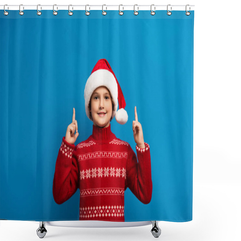 Personality  Joyful Kid In Santa Hat And Red Sweater Pointing With Fingers While Looking At Camera On Blue Shower Curtains