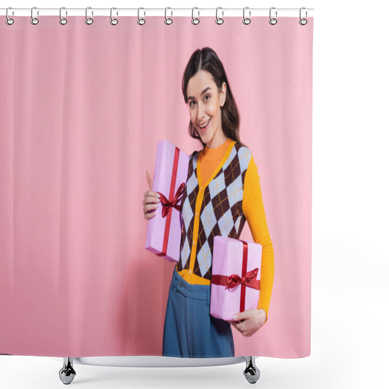 Personality  Young Woman In Bright Cardigan Holding Gift Boxes And Smiling At Camera On Pink Background Shower Curtains