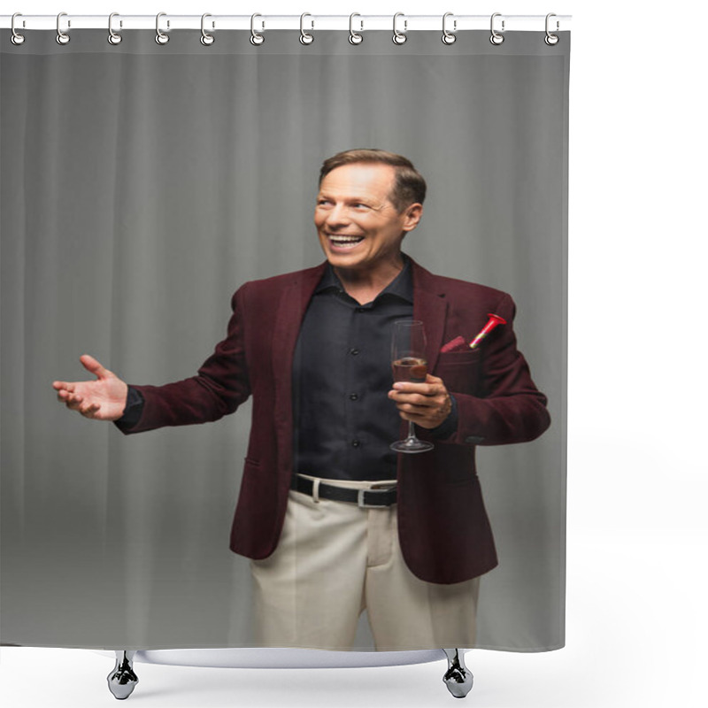 Personality  Mature Man With Champagne And Party Horn In Pocket Of Jacket Pointing With Hand Isolated On Grey  Shower Curtains