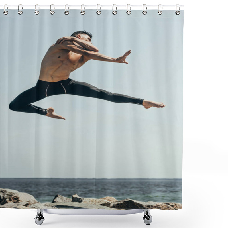 Personality  Handsome Shirtless Dancer Jumping Over Rocky Seashore Shower Curtains