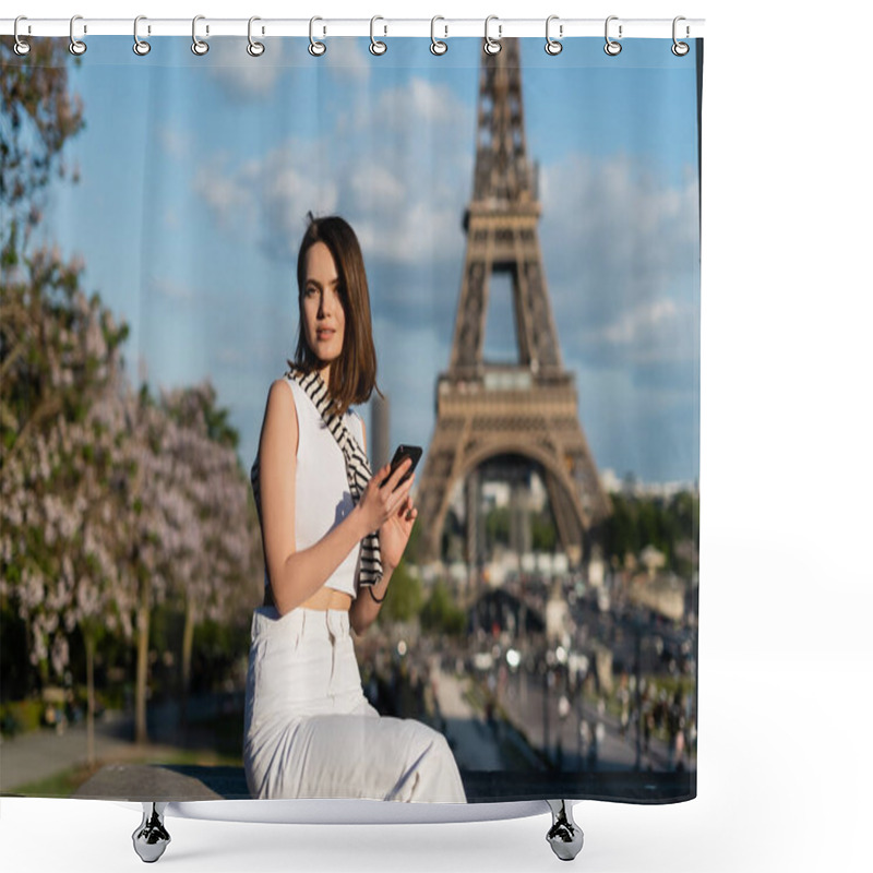 Personality  Pretty Young Woman In Stylish Outfit Using Smartphone While Sitting Near Eiffel Tower In Paris, France Shower Curtains