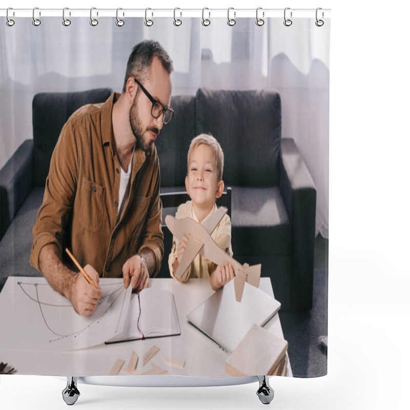 Personality  Father In Eyeglasses And Cute Little Son Modeling Plane Together At Home Shower Curtains