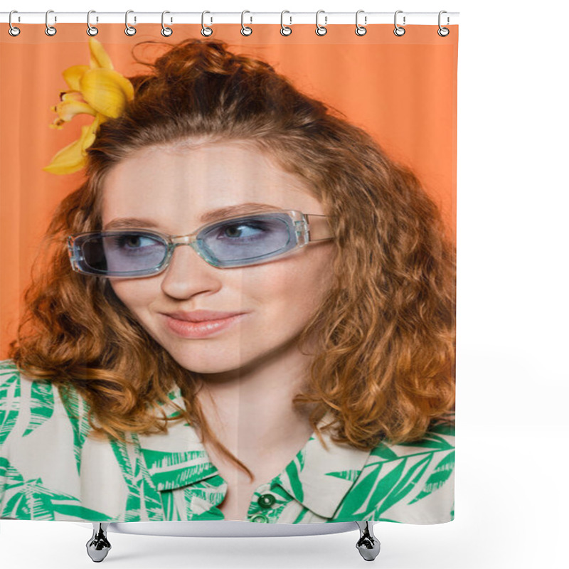 Personality  Portrait Of Young Redhead Model With Orchid Flower In Hair Wearing Blue Sunglasses And Trendy Blouse With Floral Pattern Isolated On Orange, Stylish Casual Outfit And Summer Vibes Concept Shower Curtains