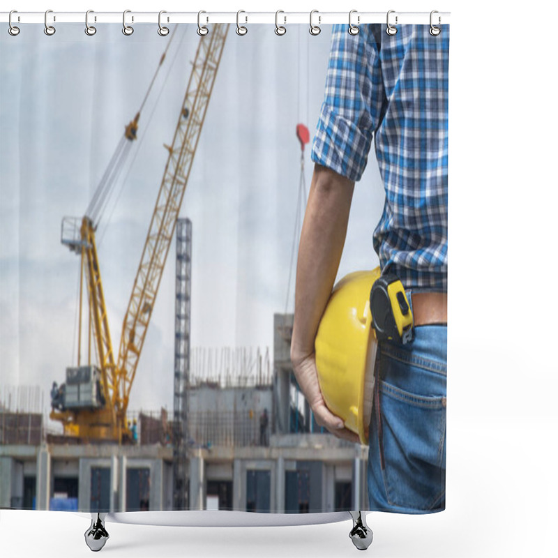 Personality  A Male Construction Worker Holds A Yellow Helmet, Standing In Front Of A Busy Construction Site With Cranes And Unfinished Buildings. Shower Curtains