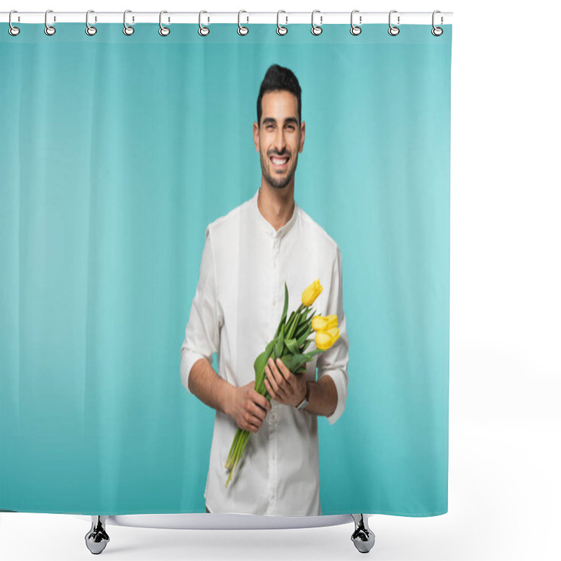 Personality  Positive Arabian Man Holding Tulip Flowers Isolated On Blue  Shower Curtains