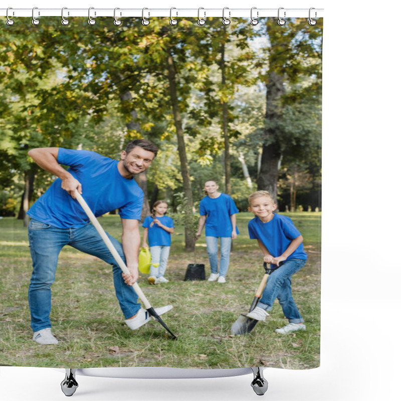 Personality  Father And Son Smiling At Camera While Digging Ground, And Mother With Daughter Holding Young Tree And Watering Can On Blurred Background, Ecology Concept Shower Curtains