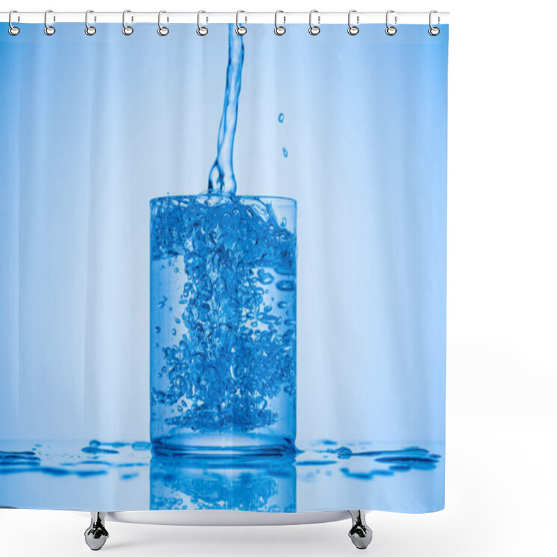 Personality  Toned Image Of Water Pouring In Full Glass On Blue Background With Splashes Shower Curtains