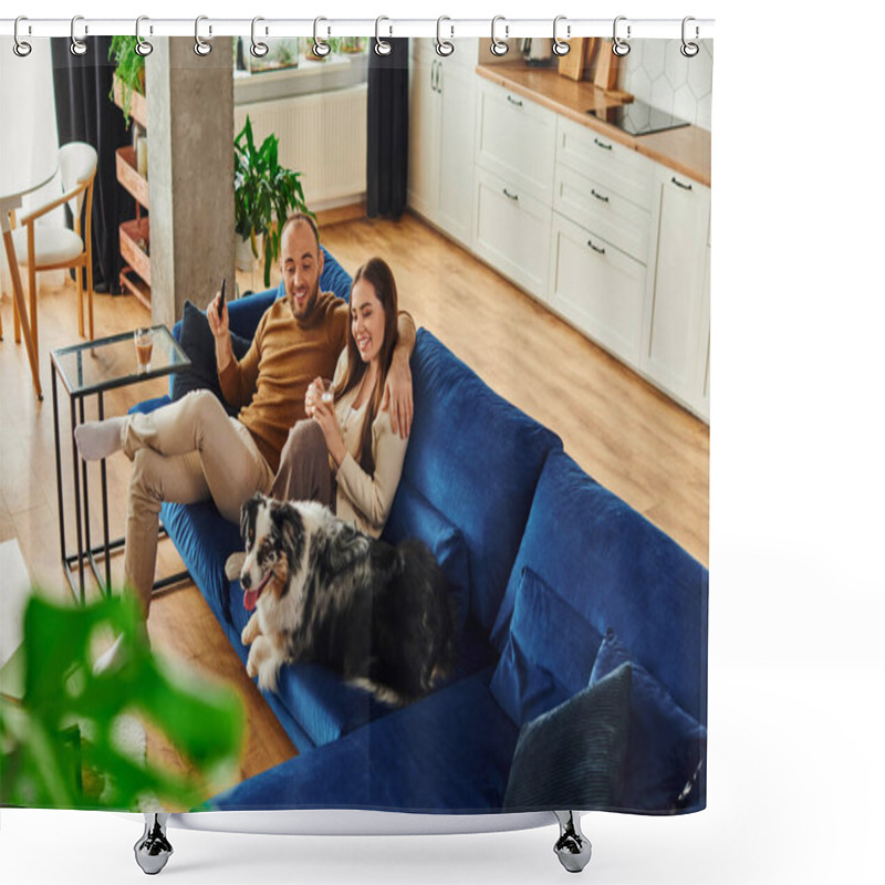 Personality  Smiling Couple With Remote Controller And Coffee Sitting Near Border Collie On Couch At Home Shower Curtains