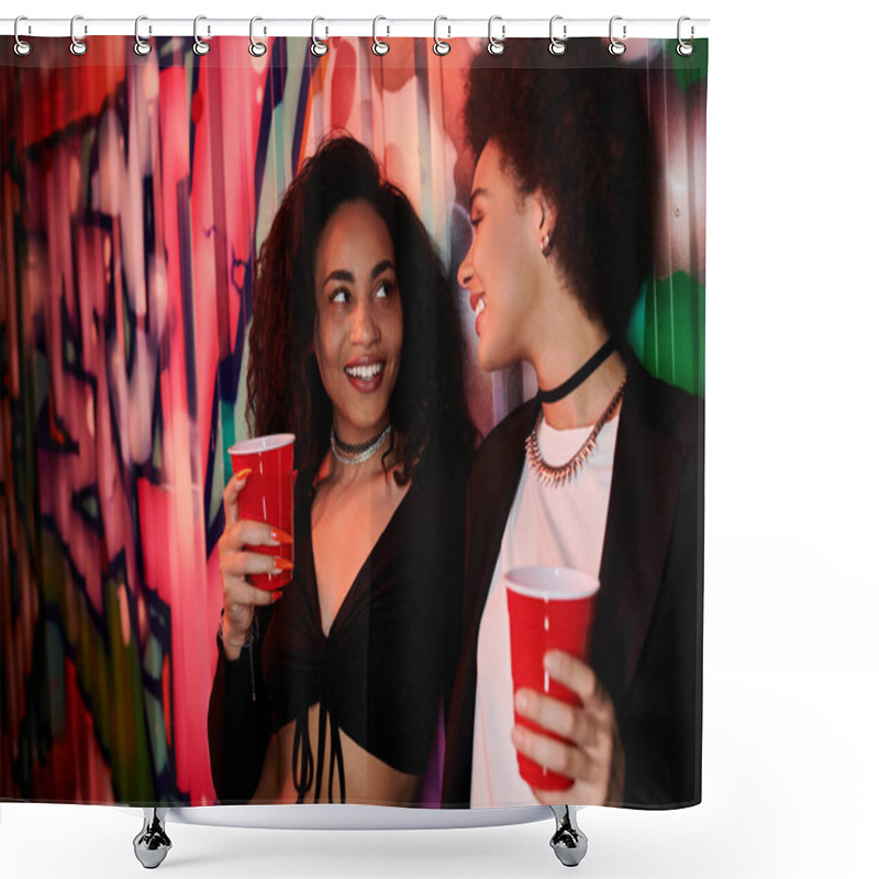 Personality  Two Women Share Joyful Moments With Drinks In Hand Amidst A Striking Graffiti Backdrop. Shower Curtains