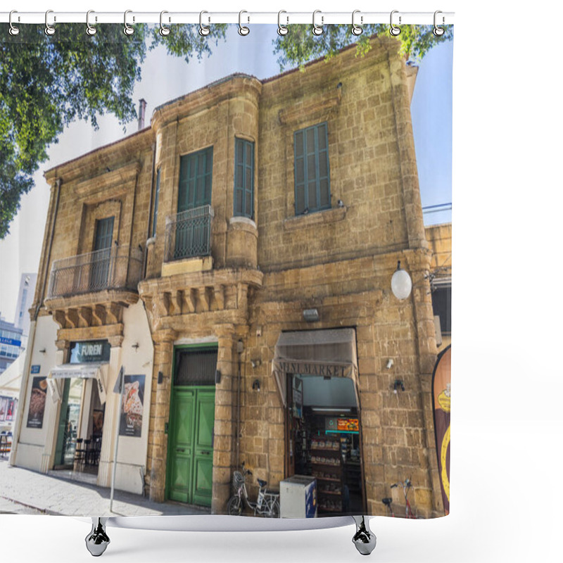 Personality  A Charming Historic Building With Classic Stone Architecture, Green Wooden Shutters, And Commercial Spaces On The Ground Floor, Located On A Shaded Street. Nicosia, Cyprus - October 26, 2024. Shower Curtains