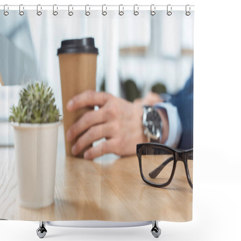 Personality  Cropped Image Of Businessman Sitting With Disposable Coffee Cup At Table With Potted Plant And Eyeglasses In Modern Office  Shower Curtains