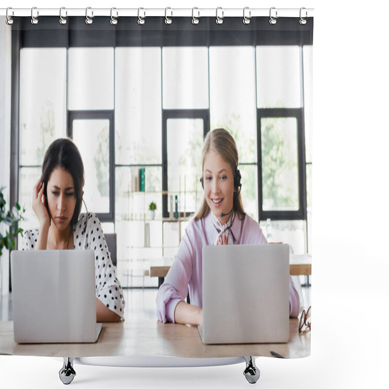 Personality  Happy Operator In Headset Smiling While Looking At Laptop Near Coworker  Shower Curtains