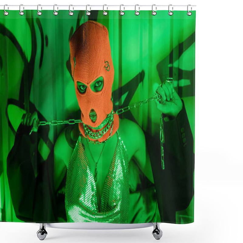 Personality  Seductive Woman In Balaclava And Silver Top Holding Chains Near Wall With Graffiti In Green Neon Light Shower Curtains