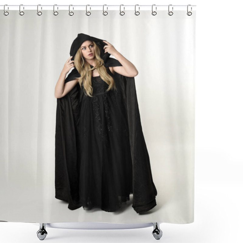 Personality  Full Length Portrait Of Blonde Girl Wearing Long Black Flowing Cloak, Standing Pose  With  A White Studio Background. Shower Curtains