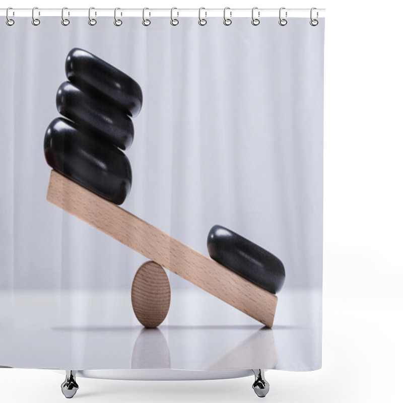 Personality  Black Stones Balancing On Wooden Seesaw Over The White Background Shower Curtains