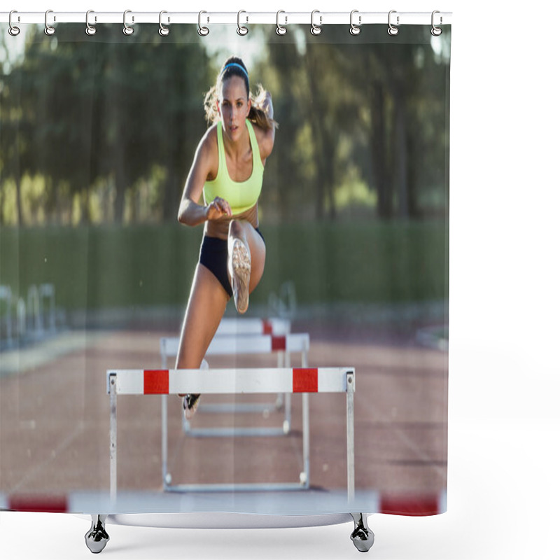 Personality  Young Athlete Jumping Over A Hurdle During Training On Race Trac Shower Curtains