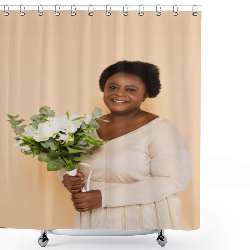 Personality  Smiling African American Middle Aged Woman In Pastel Clothes With Bouquet Of Flowers Isolated On Beige Shower Curtains